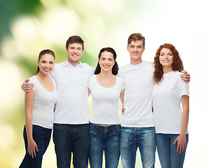 Image showing group of smiling teenagers in white blank t-shirts