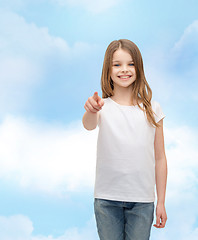 Image showing little girl in blank white t-shirt pointing at you