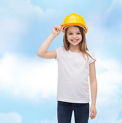 Image showing smiling little girl in protective helmet