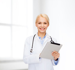 Image showing female doctor with stethoscope and tablet pc