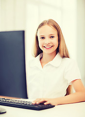 Image showing student girl with computer at school