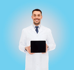 Image showing smiling male doctor with tablet pc