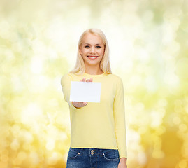 Image showing smiling girl with blank business or name card