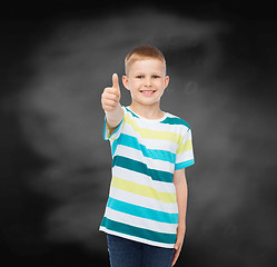 Image showing little boy in casual clothes with arms crossed