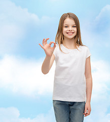 Image showing little girl in white t-shirt showing ok gesture