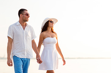 Image showing smiling couple walking outdoors