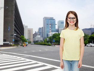 Image showing smiling cute little girl in black eyeglasses