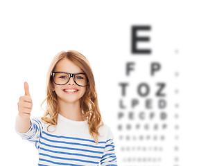 Image showing little girl with black eyeglasses
