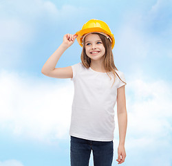 Image showing smiling little girl in protective helmet