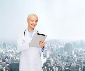 Image showing female doctor with stethoscope and tablet pc