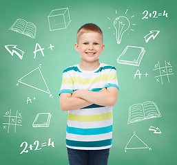 Image showing little boy in casual clothes with arms crossed