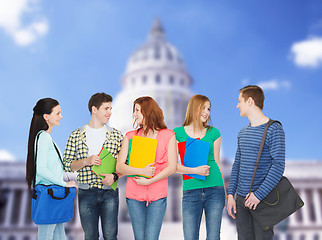 Image showing group of smiling students standing