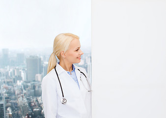 Image showing smiling female doctor with stethoscope