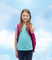 Image showing smiling girl with school bag showing thumbs up