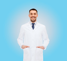 Image showing smiling male doctor in white coat