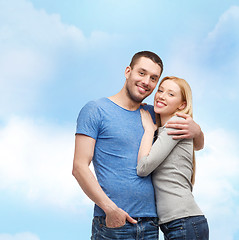 Image showing smiling couple hugging