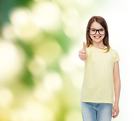 Image showing smiling cute little girl in black eyeglasses