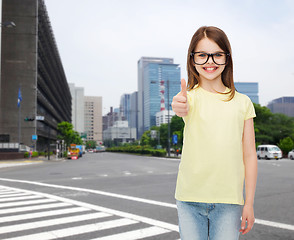 Image showing smiling cute little girl in black eyeglasses