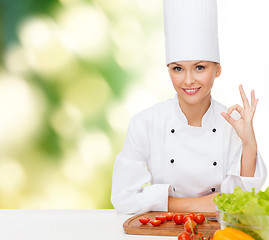 Image showing female chef with vegetables showing ok sign