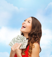 Image showing woman in red dress with us dollar money