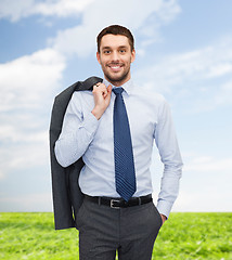 Image showing smiling young and handsome businessman