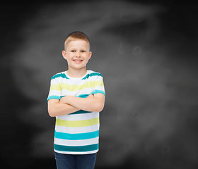 Image showing little boy in casual clothes with arms crossed