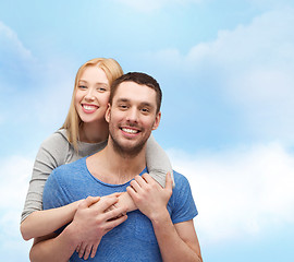 Image showing smiling couple hugging