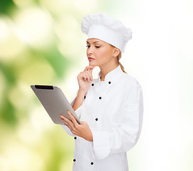 Image showing smiling female chef with tablet pc computer