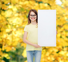 Image showing little girl wearing eyeglasses with blank board