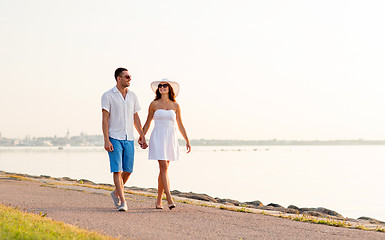 Image showing smiling couple walking outdoors