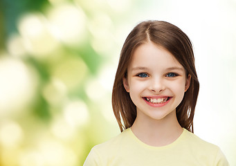 Image showing smiling little girl over white background