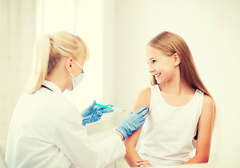 Image showing doctor doing vaccine to child in hospital