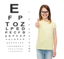 Image showing smiling cute little girl in black eyeglasses