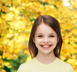 Image showing smiling little girl over white background