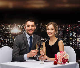 Image showing couple with glasses of champagne at restaurant