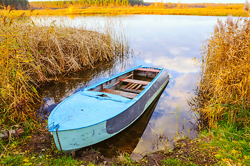 Image showing River And Blue Rowing Boat