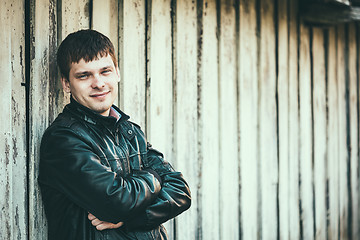 Image showing Handsome man outdoors portrait. Autumn colors.