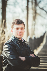 Image showing Handsome man outdoors portrait. Autumn colors.