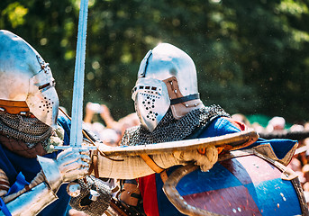 Image showing Knights in a fight with swords