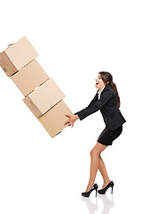 Image showing Stumbling with a pile of card boxes