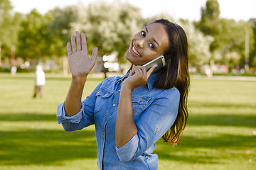 Image showing Beautiful woman talking at phone