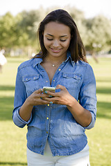 Image showing Beautiful woman texting