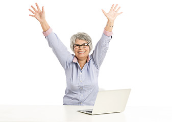 Image showing Ellderly woman working with a laptop