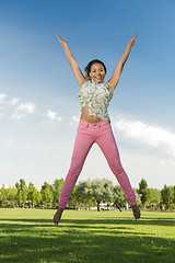 Image showing Beautiful African American woman jumping