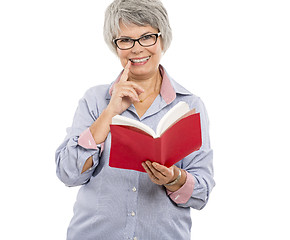 Image showing Elderly woman reading a book