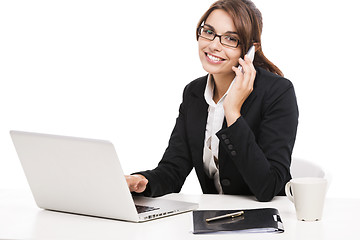 Image showing Businesswoman answering phone