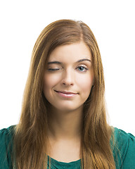 Image showing Beautiful young woman blinking eye