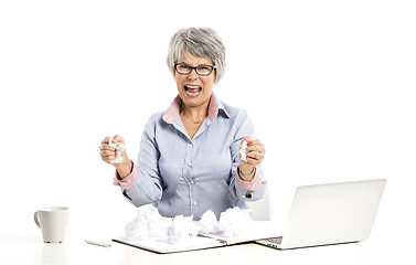 Image showing Ellderly woman working with a laptop