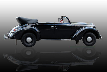 Image showing retro car isolated on the dark background