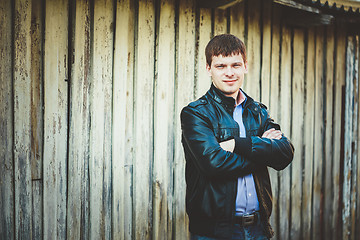 Image showing Handsome man outdoors portrait. Autumn colors.